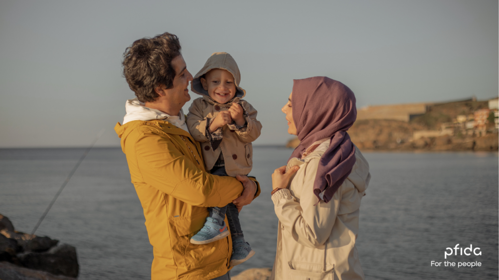 Muslim family by the waterfront enjoying a moment together | 3 Key Lessons from the Halal Homebuying Scholars Roundtable 